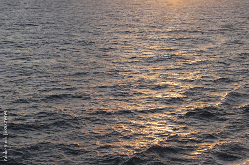 The sun reflecting on the open Caribbean ocean.