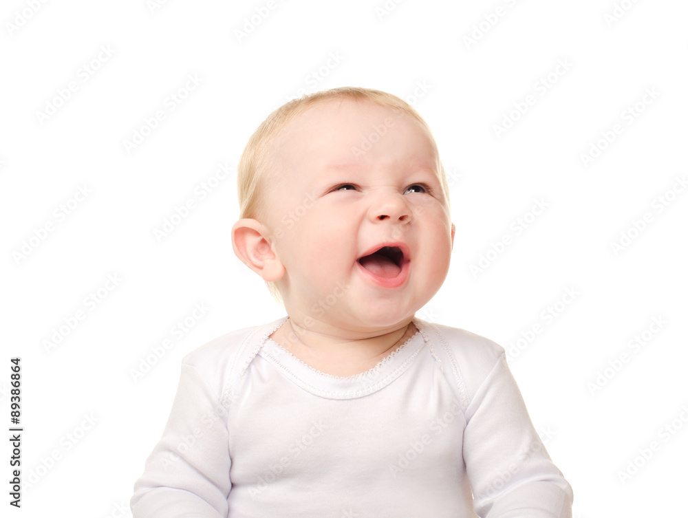 laughing funny baby boy in white