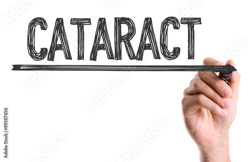 Hand with marker writing the word Cataract