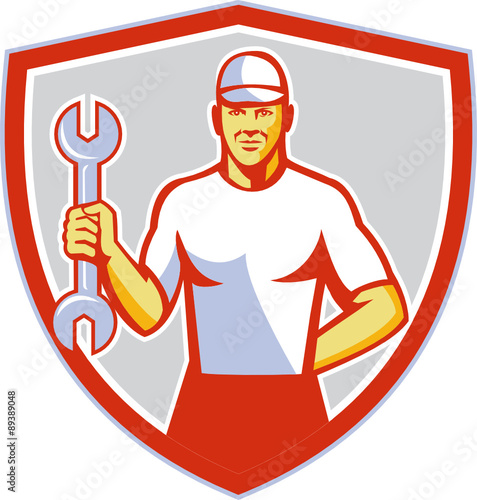Mechanic Holding Wrench Crest Retro