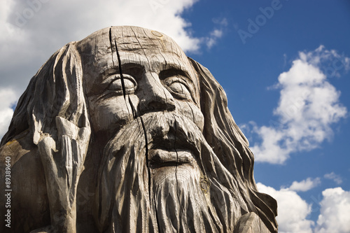 Tableau sur toile Wooden statue of the idol.