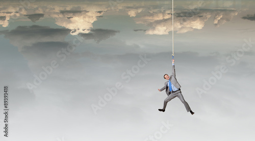 Man hang on rope