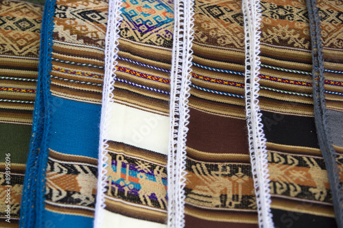 Background of colored fabrics from Bolivia ethnic market