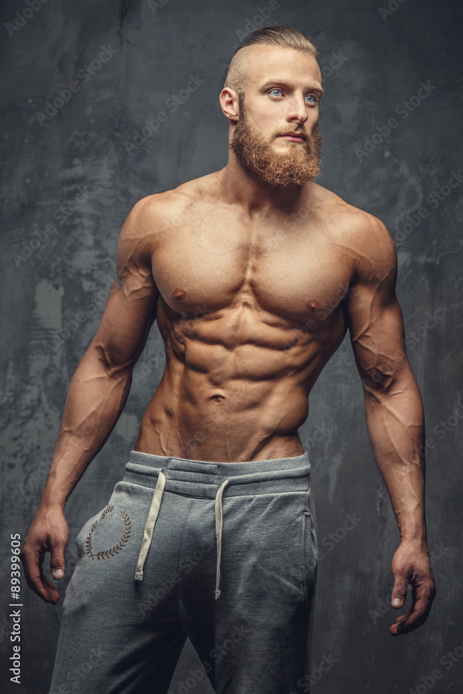 Shirtless bodybuilder with beard. Shirtless bodybuilder with beard.