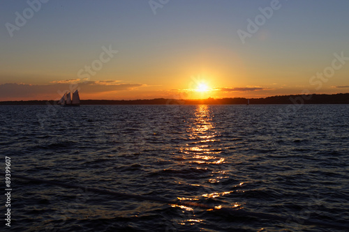 Sail boat at sunset.