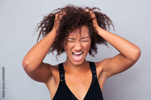 Portrait of afro american woman shouting