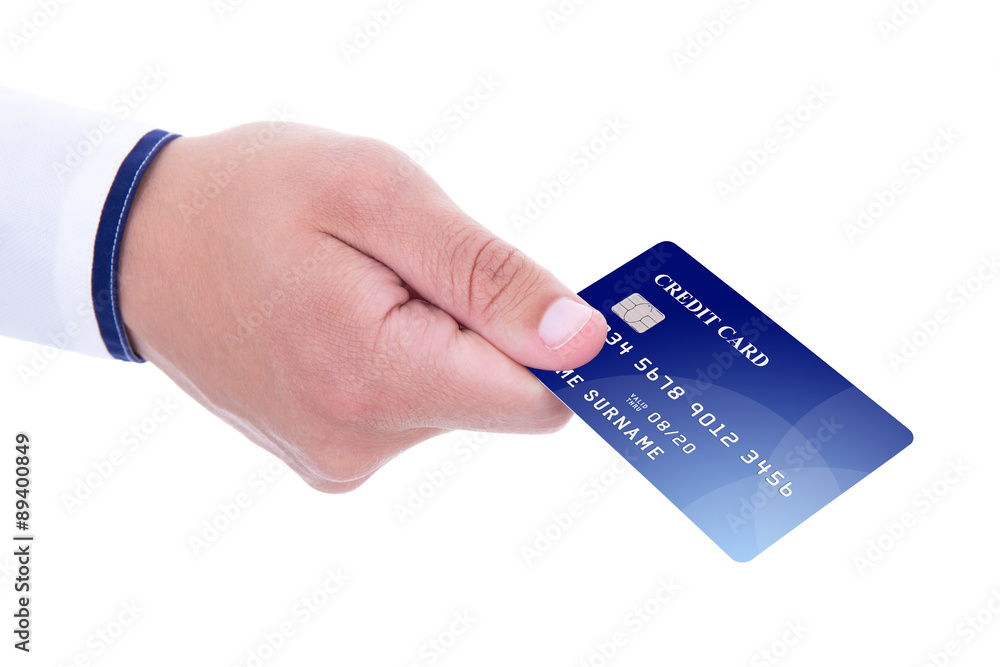 male hand giving credit card isolated on white male hand giving credit card isolated on white