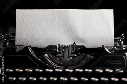 typewriter with paper sheet. Space for your text photo