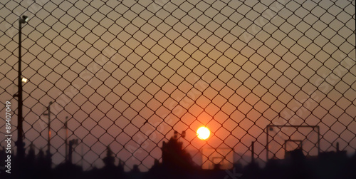 Barbed wire Sunset basket prison