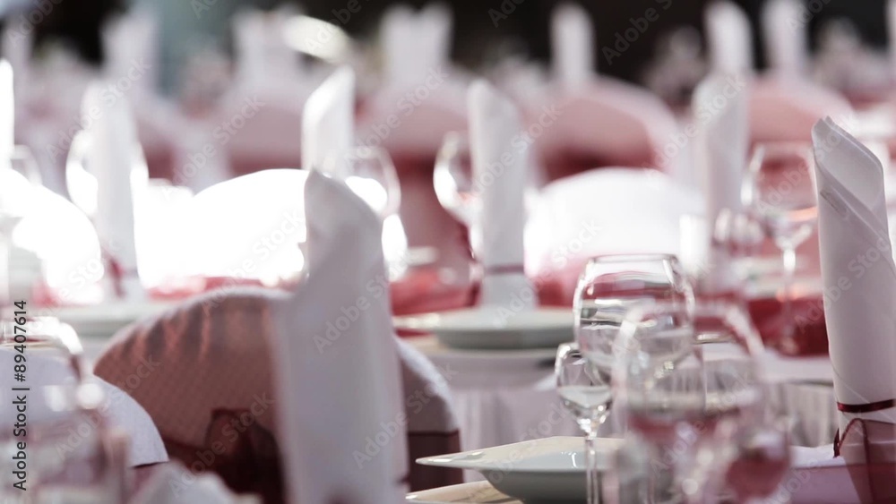 Table set for event party or wedding reception with flowers decoration Table set for event party or wedding reception with flowers decoration