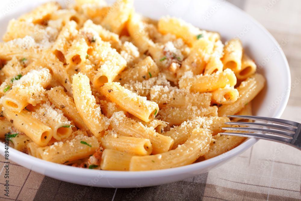 Penne with tomatos and parmesan cheese Penne with tomatos and parmesan cheese