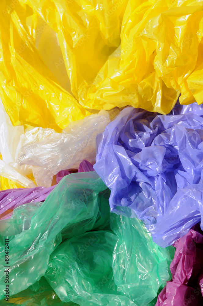 Fototapeta premium Separated colorful used plastic shopping bags for waste collection