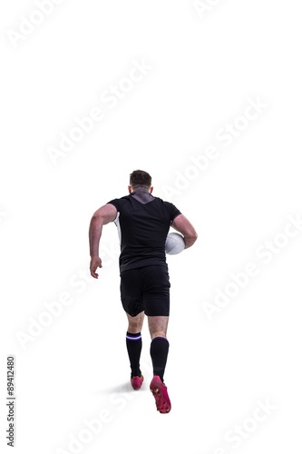 Rugby player running with the ball © WavebreakmediaMicro