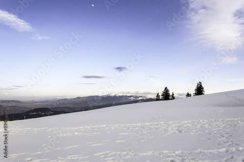 winter mountain landscape with cloudy sky 
