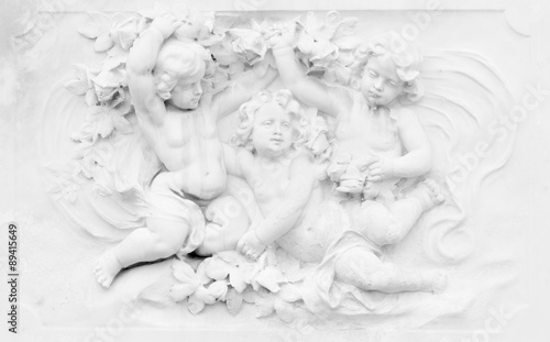 Canvas Print Black and white photography of basrelief with cherubs