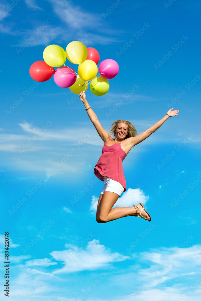 pretty student jumping with colourful balloons in hands pretty student jumping with colourful balloons in hands