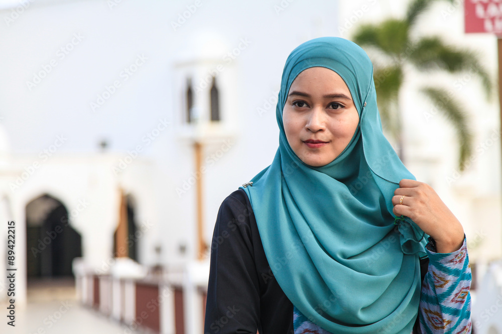 young muslim woman at Mosque in Kuala Terengganu, Malaysia young muslim woman at Mosque in Kuala Terengganu, Malaysia