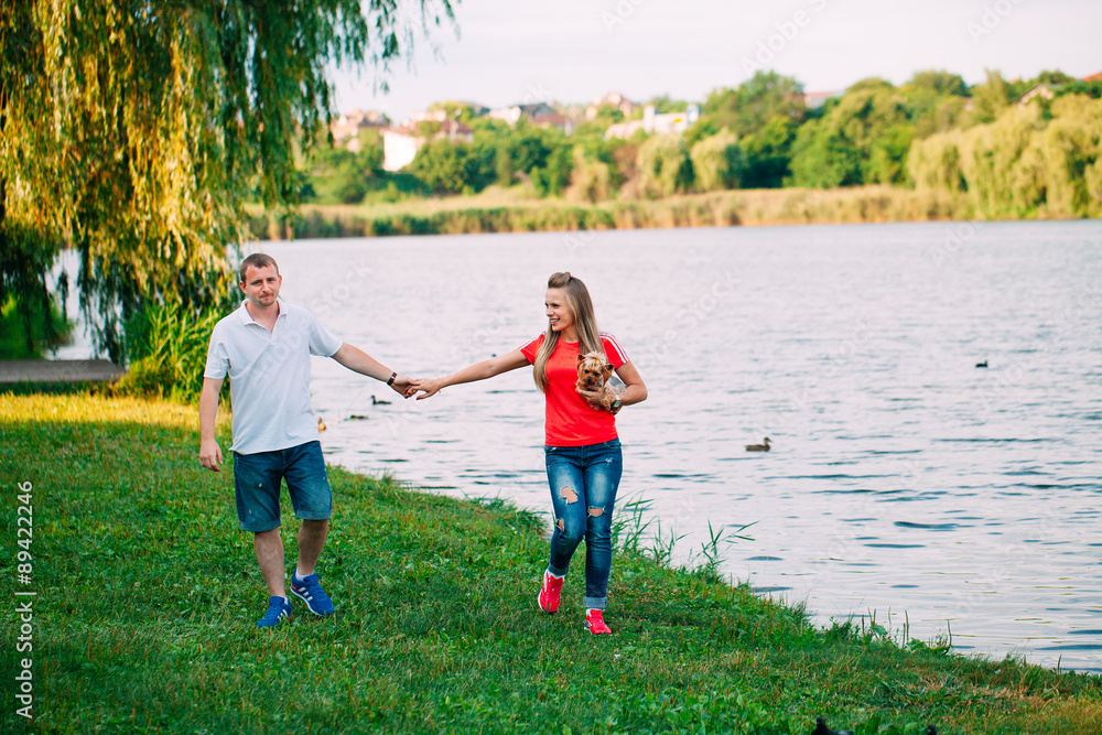 Fototapeta premium Beautiful loving couple going for a walk outdoors