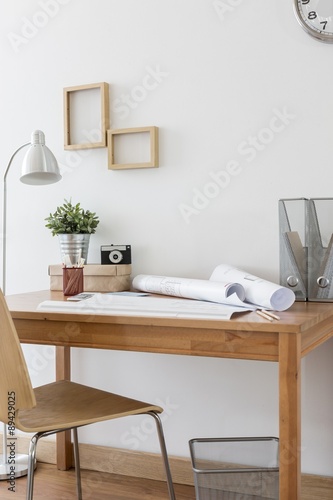 Simple wooden desk and chair © Photographee.eu