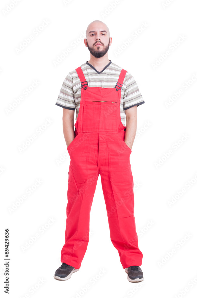 Plumber or mechanic standing confident Plumber or mechanic standing confident