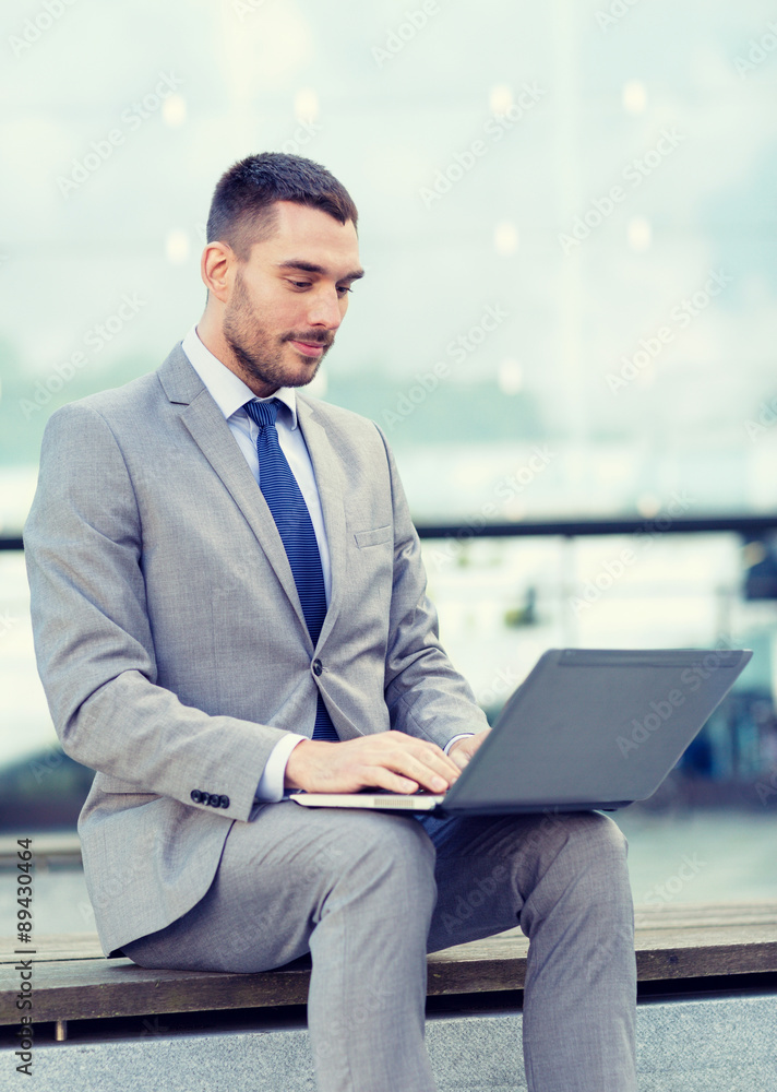 businessman working with laptop outdoors businessman working with laptop outdoors
