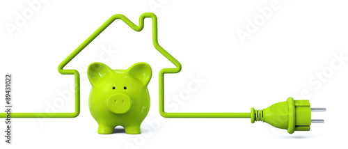 Foto Green power plug - house with green piggy bank