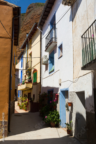 Narrow street of spanish village in summer day. Tarazona