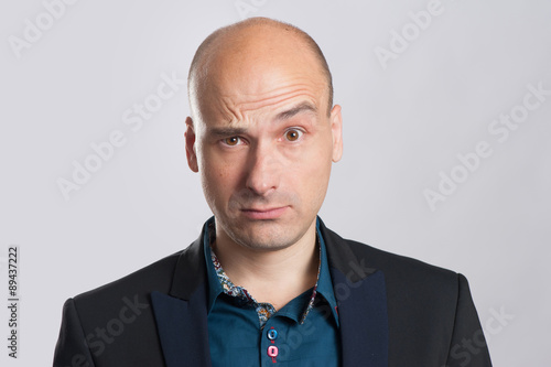 portrait of astonished businessman