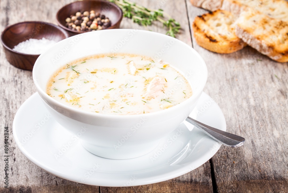 homemade soup with salmon and cream with croutons