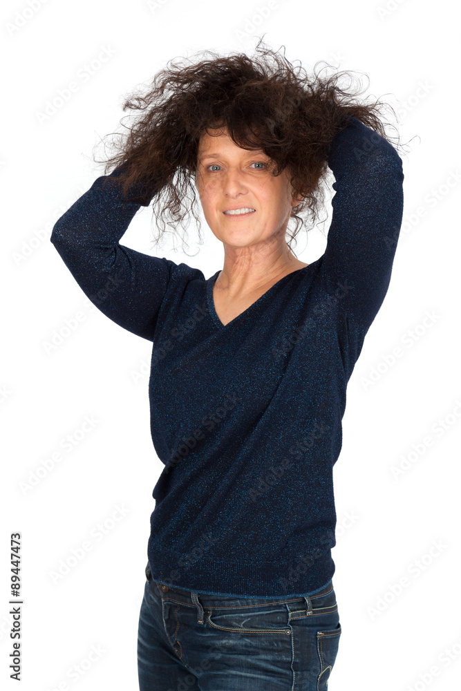 Beautiful woman doing different expressions in different sets of clothes hands in hair Beautiful woman doing different expressions in different sets of clothes hands in hair