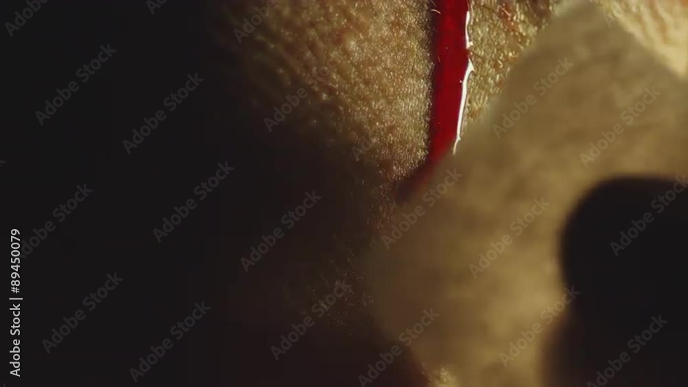 Man dabs blood dripping down his neck Stock Video | Adobe Stock