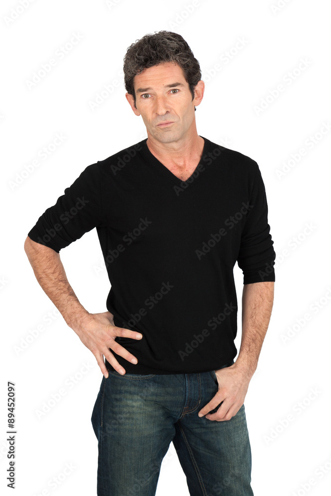 Handsome man doing different expressions in different sets of clothes: hands in pockets Handsome man doing different expressions in different sets of clothes: hands in pockets