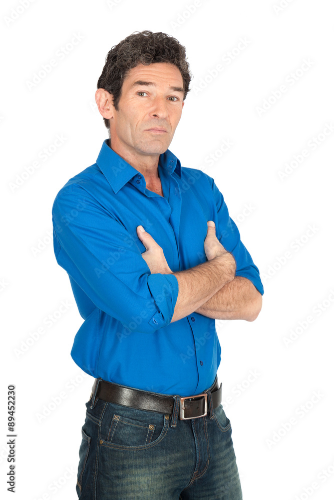 Handsome man doing different expressions in different sets of clothes: arms crossed Handsome man doing different expressions in different sets of clothes: arms crossed