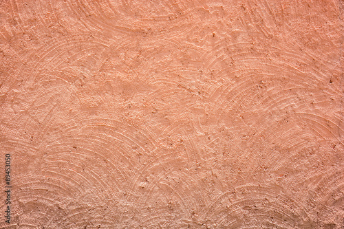 Red-brown rough plaster wall texture