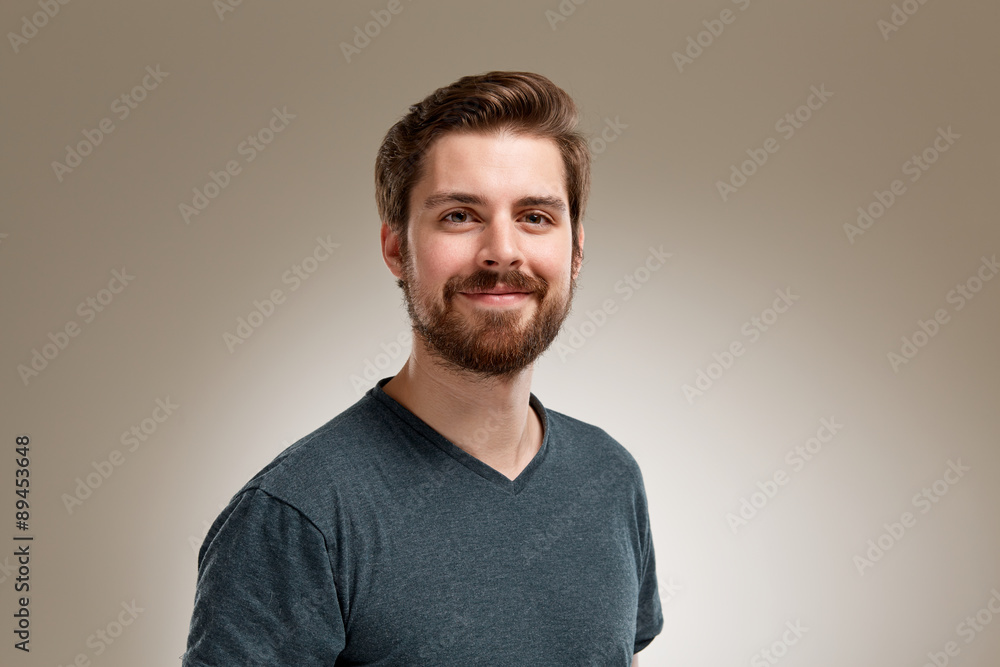 Portrait of smiling 20s man with beard