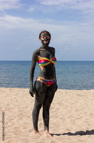 Women looking disapointed at the beach photo