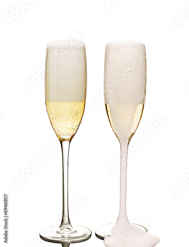 two flute glasses full of champagne