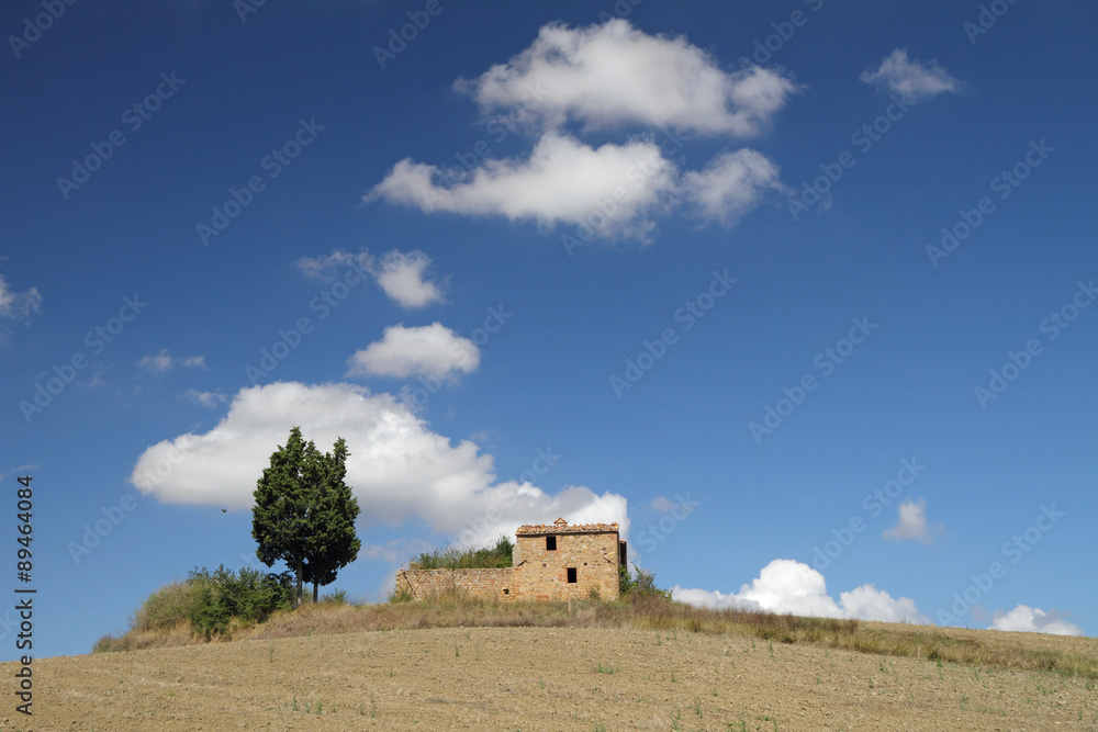 house on hill in tuscan countryside, Italy