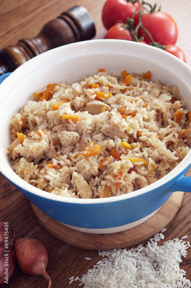 Rice cooked with vegetables and spices in ceramic form Rice cooked with vegetables and spices in ceramic form