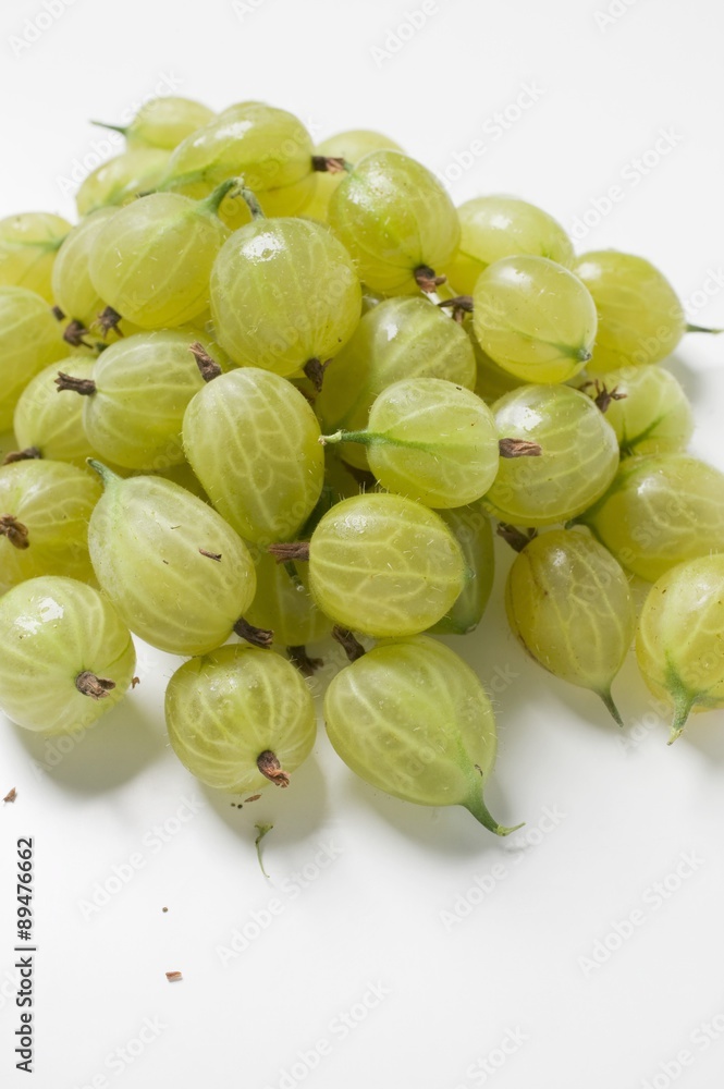 A heap of green gooseberries A heap of green gooseberries