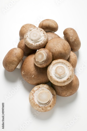 Several fresh chestnut mushrooms