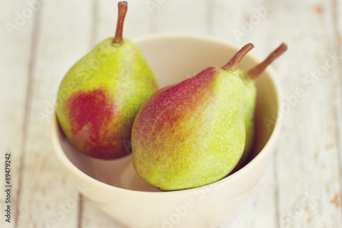 Three pears in a bowl