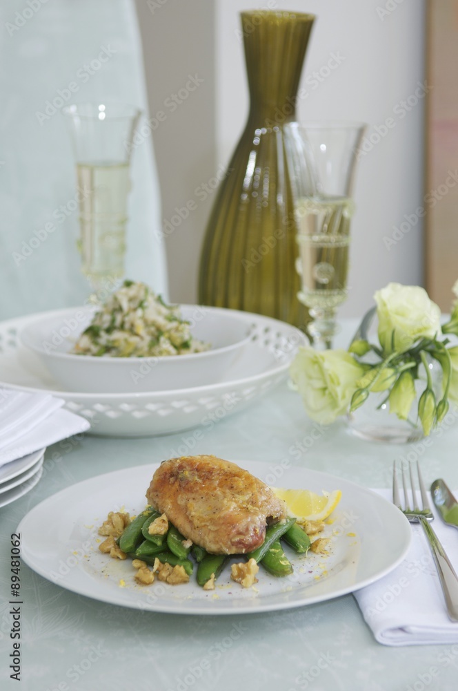 Lemon and garlic chicken on sugar snap peas Lemon and garlic chicken on sugar snap peas