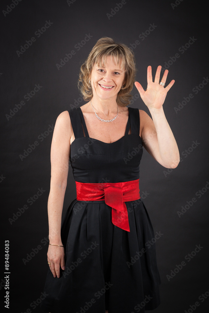 Beautiful woman doing different expressions in different sets of clothes: waving Beautiful woman doing different expressions in different sets of clothes: waving