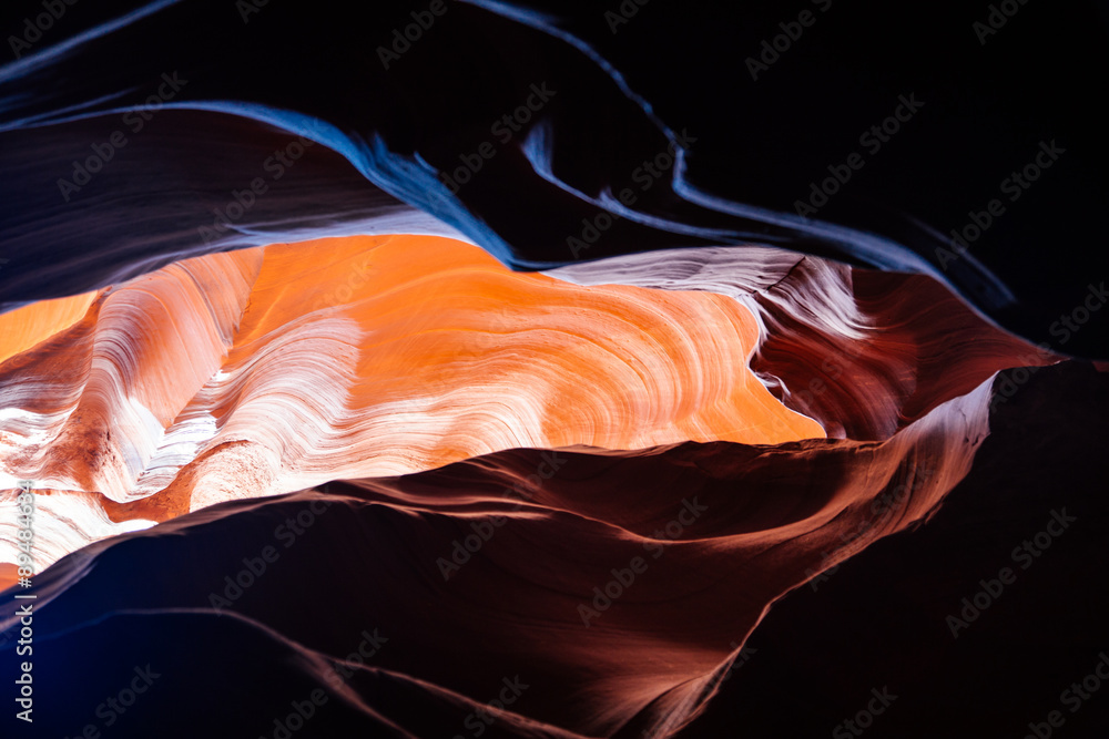 Fototapeta premium Sunlight spilling into a slot canyon