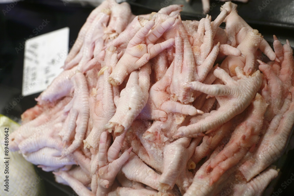 Fresh Chicken Feet at a Market