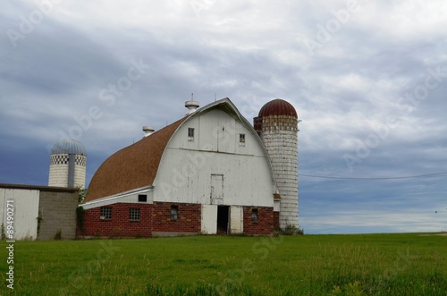 Typical upper Midwest farm equipment storage barn and cloudy day