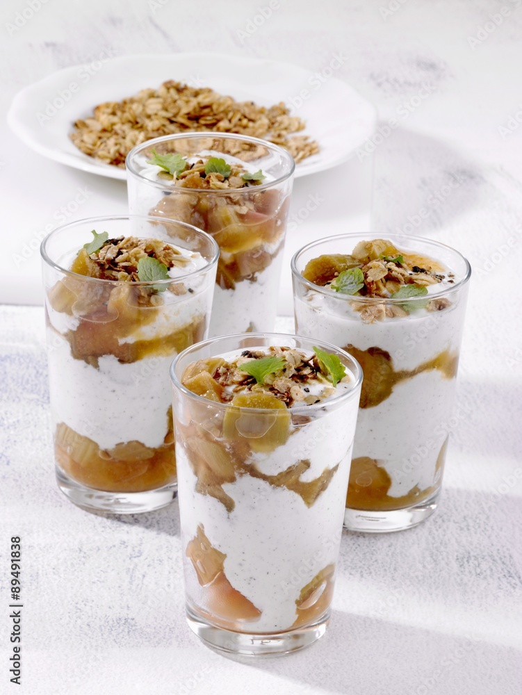 Layered rhubarb desserts with roasted oats Layered rhubarb desserts with roasted oats