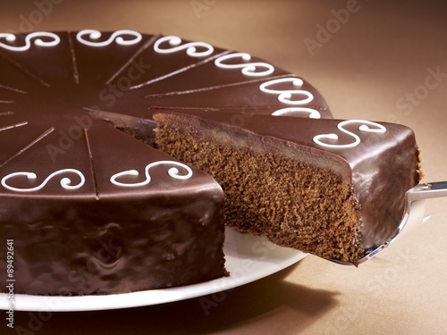 chocolate cake, a piece removed