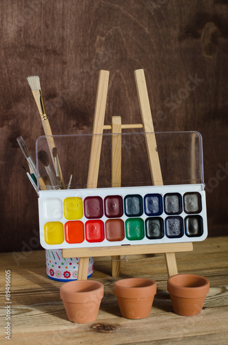 Art supplies. Watercolor paint, brushes, Photography.